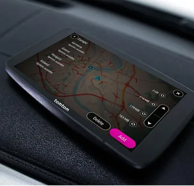 A close-up of a TomTom navigation device displaying a map.