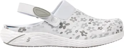 A side view of a white clog with a floral pattern.