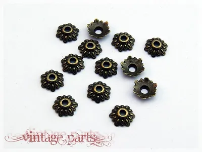 Produktbild von Vintageparts Perlkappen vintage Bronze Blüte 8 mm, 30 Stück