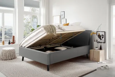 Produktbild von Meise Möbel Stauraumbett Frieda 140x200 cm | Bettkasten & Lattenrost | Webstoff Hellgrau | Holzfuß schwarz