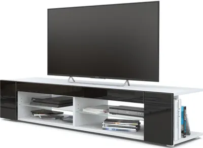 Produktbild von Vladon Lowboard Movie, TV-Kommode mit 4 offenen Fächern und Zierleisten, Weiß matt/Schwarz Hochglanz (134 x 29 x 39 cm)