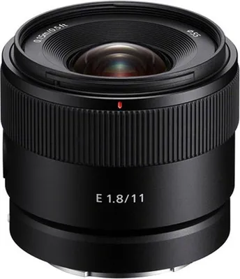 A close-up studio shot of a black camera lens.
