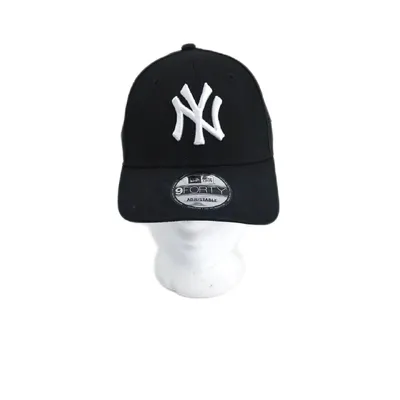 A black New Era Yankees baseball cap with a white NY logo is displayed on a white mannequin head against a white background.