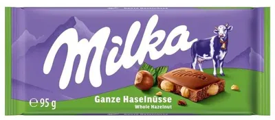 Produktbild von Milka Ganze Haselnüsse 95g