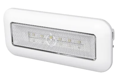 A white LED battery-powered light fixture with a textured lens.