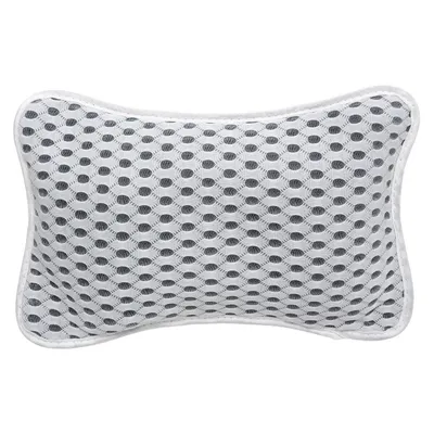 A white and gray bath pillow with a dot pattern.
