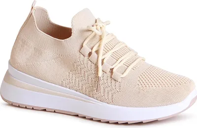 A single beige sneaker shown from the side against a white background.