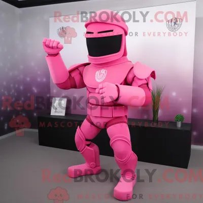 Zdjęcie produktu dla Maskotkarakter REDBROKOLY av en rosa spartansk solutt kledd med golf i omslag