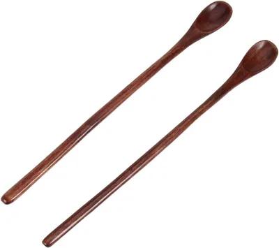 Two wooden spoons with long handles are shown against a white background.