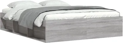 A bed frame with bedding.