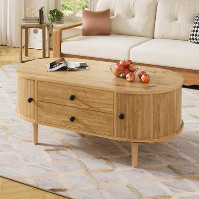 Produktbild von Merax Ovaler Couchtisch mit vertikalen Leisten, Wohnzimmertisch mit 2 Schubladen und Schiebetüren, Sofatisch aus MDF mit Massivholzbeine, Natur