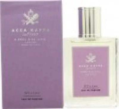 A perfume bottle and its box are displayed side-by-side against a white background.
