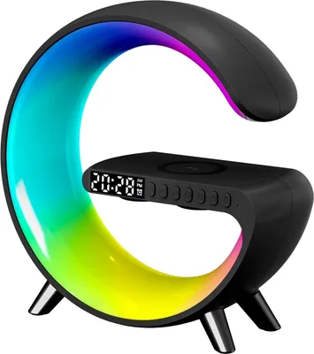 A black desk lamp with a curved, rainbow-colored light element and a digital clock display.