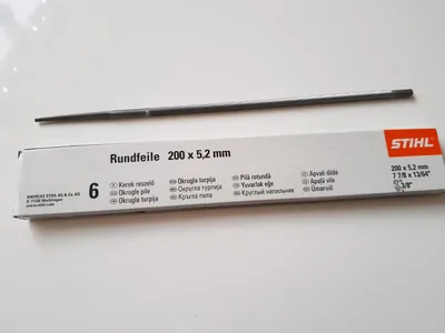 A Stihl round file and its packaging are shown on a white background.