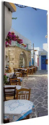 Produktbild von Wallario Premium Leinwandbild Gasse in Griechenland in Größe 50 x 125 cm
