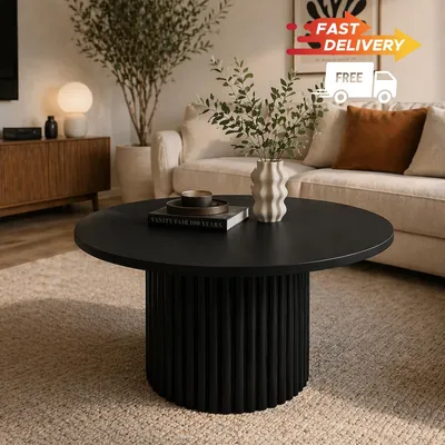 Produktbild von Design-Couchtisch Ollio – Rund, Schwarz, mit geriffeltem Metallfuß, Ø75 cm