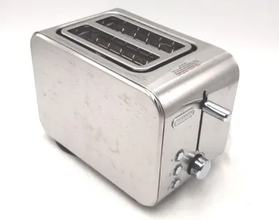 A stainless steel toaster on a white background.
