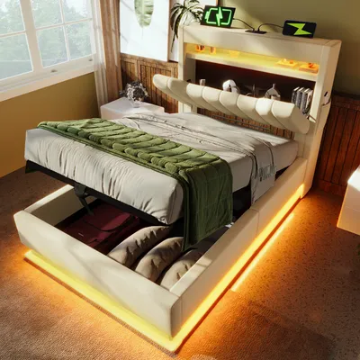A modern bedroom with a bed that has storage and LED lighting.