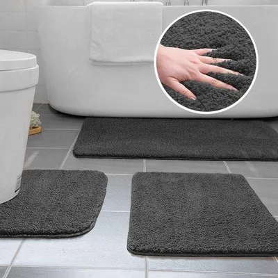 Immagine prodotto di Set di 3 tappetini da bagno in microfibra Unyqoos®: morbidi, assorbenti, con pelo di 2,5 cm e base in gomma TPR antiscivolo per una presa sicura