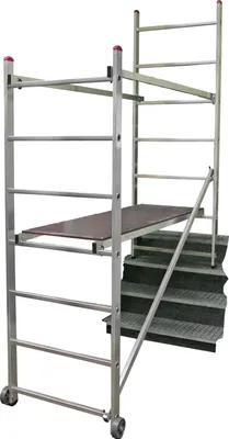 A mobile scaffolding unit with integrated stairs.