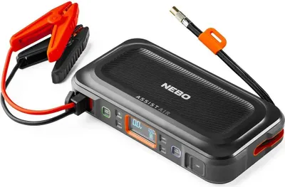 A black and gray portable jump starter and air compressor with red and black jumper cables attached.