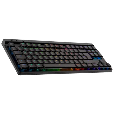 A black gaming keyboard with RGB lighting is shown against a white background.