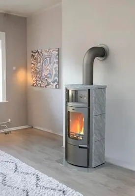 Produktbild von Kaminofen Rotheigner Bern Naturstein 7 kW