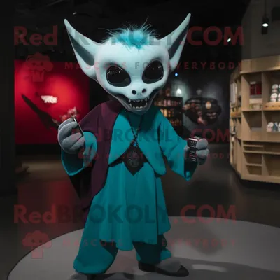Immagine prodotto di Personaggio in costume mascotte REDBROKOLY Teal Vampire vestito con culottes e portachiavi