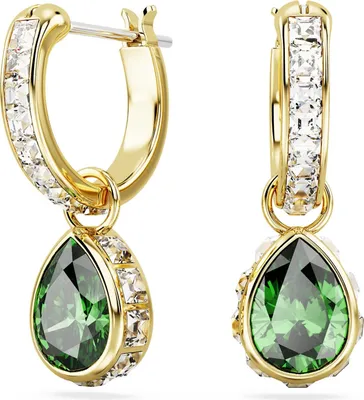 A pair of gold-colored hoop earrings with green teardrop-shaped gemstones and clear accent stones.