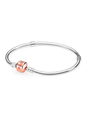 Produktbild von PANDORA Moments Schlangen-Gliederarmband mit Zylinderverschluss aus Sterling-Silber und 14 rosévergoldeter Metalllegierung, kompatibel mit Charms und Anhängern aus der Moments Kollektion 20cm
