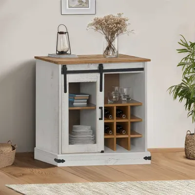 A white and wood sideboard with sliding doors, displaying glasses and wine bottles.