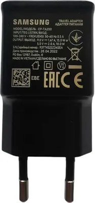 A black Samsung travel adapter with product information printed on it.