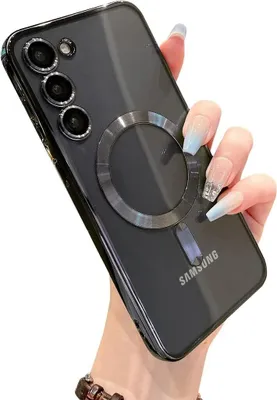 A hand holding a black Samsung phone case with a magnetic ring.