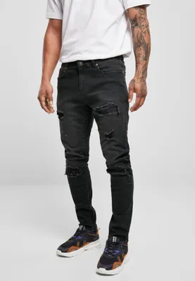 Zdjęcie produktu dla Urban Classics Heavy Destroyed Slim Fit Jeans realblk heavy destroyed washed - 32/32
