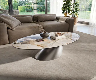 Produktbild von DELIFE Couchtisch Edge Oval 135x80 cm Keramik Patagonia Poliert Conis Edelstahl gebürstet
