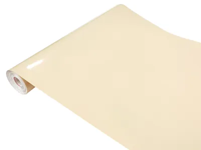 A roll of beige glossy self-adhesive film.