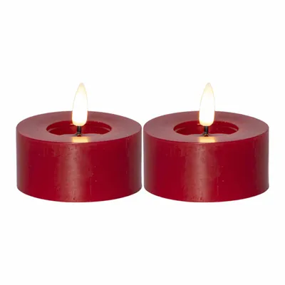 Two red LED candles with lit flames, presented on a white background.