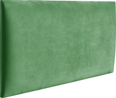 A green upholstered headboard panel.
