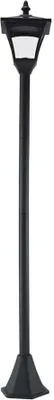 A black solar-powered garden lantern on a white background.