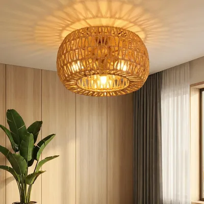 A rattan ceiling lamp is shown hanging from the ceiling in a room with wooden walls and curtains.
