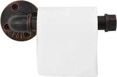 Imagen del producto de Soporte de pared para limpiador de inodoros de color bronce. Ideal para baños