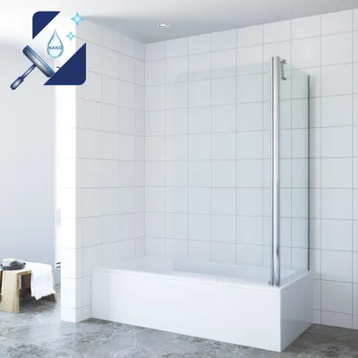 A modern bathroom with a white bathtub and a glass shower screen.