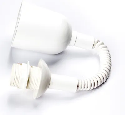 A white lamp suspension with a coiled cable and an E27 socket is shown against a white background.