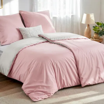 Immagine prodotto di Set di lenzuola 135x200 cm, 4 pezzi, rosa/beige, in microfibra. Lenzuola reversibili con cerniera