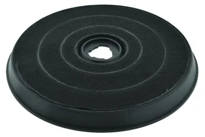 A black circular carbon filter with concentric rings and a central opening.