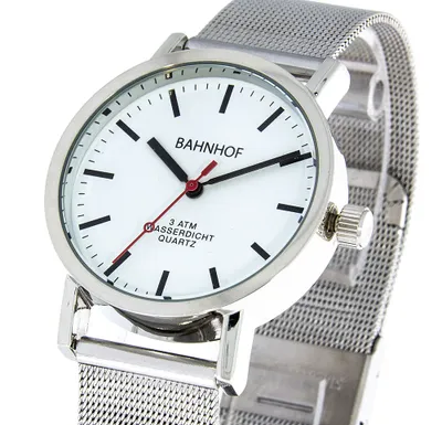 A close-up shot of a silver analog watch with a white face and a mesh stainless steel band.