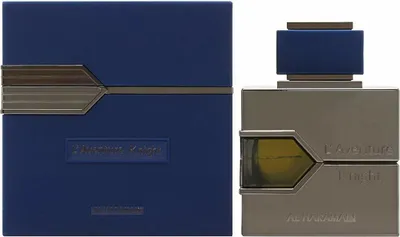 Two perfume bottles, one in a blue box and one a silver bottle, are shown side-by-side against a white background.