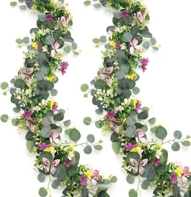 Produktbild von 2 Stück 5.68FT Künstliche Blumengirlande Deko Eukalyptus Girlande mit 3D Schmetterlinge Gefälschte Gänseblümchenreben Hängende Grün Girlande für Tischdeko Hochzeit Garten Wand Party Nachbildung