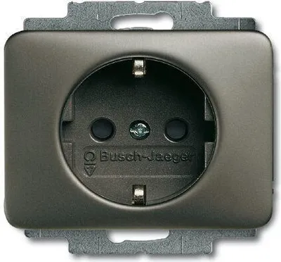 A close-up of a single electrical outlet.