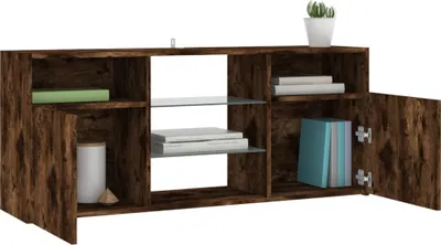A wooden TV cabinet with open shelves and closed compartments, some containing books and a vase.